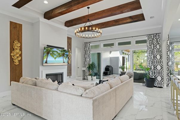 Chandelier, Fireplace, Interior, Living room, Marble, Recessed Lighting, Wooden Beams
