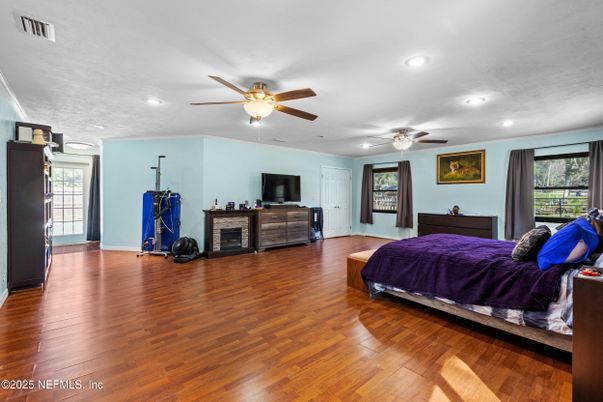Bedroom, Fireplace, Interior, Recessed Lighting, Wood Texture Flooring
