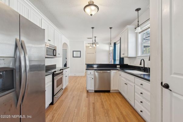 Interior, Kitchen, Pendant Lights, Stainless Steel Appliances, Wood Texture Flooring
