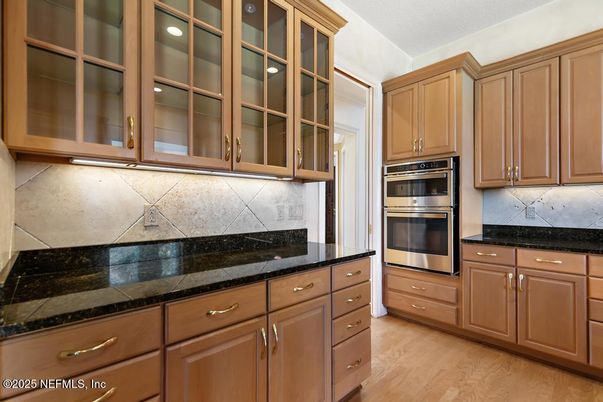 Interior, Kitchen, Stainless Steel Appliances, Tile Countertops, Wood Texture Flooring