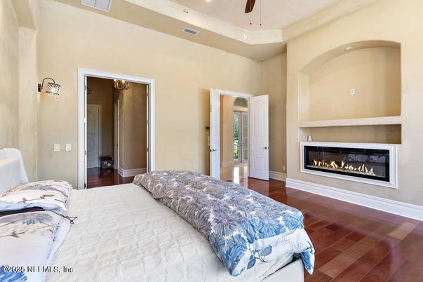 Bedroom, Fireplace, Interior, Recessed Lighting, Wood Texture Flooring