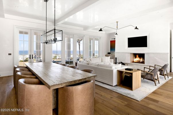 Dining room, Fireplace, Interior, Living room, Pendant Lights, Water, Wood Texture Flooring