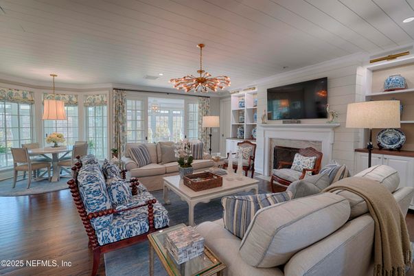 Dining room, Fireplace, Interior, Living room, Pendant Lights, Recessed Lighting, Wood Texture Flooring