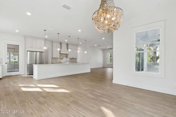 Chandelier, Interior, Kitchen, Pendant Lights, Recessed Lighting, Stainless Steel Appliances, Wood Texture Flooring