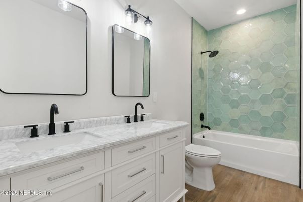 Bathroom, Dual Sink Vanities, Glass Shower, Interior, Recessed Lighting, Wood Texture Flooring