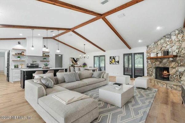 Dining room, Fireplace, Interior, Kitchen, Living room, Pendant Lights, Recessed Lighting, Stone Walls, Wooden Beams, Wood Texture Flooring