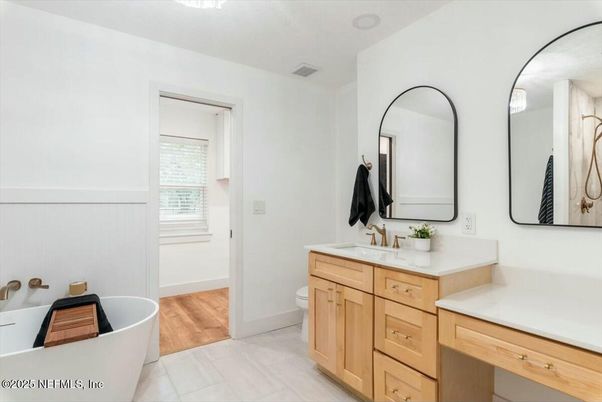 Bathroom, Dual Sink Vanities, Free Standing Baths, Interior, Wood Texture Flooring
