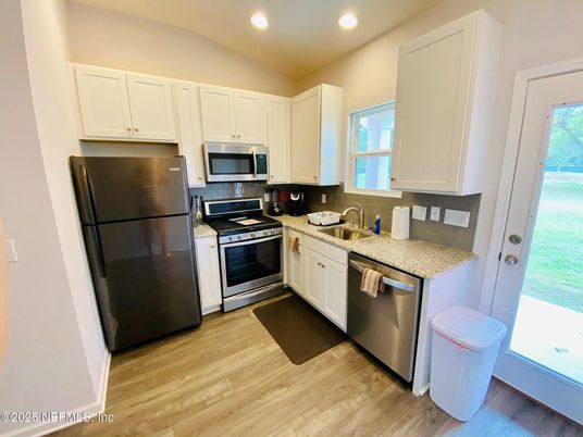 Interior, Kitchen, Recessed Lighting, Stainless Steel Appliances, Wood Texture Flooring