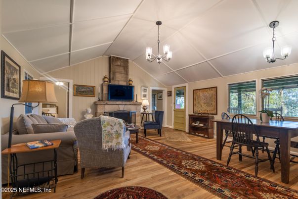 Chandelier, Dining room, Fireplace, Interior, Living room, Pendant Lights, Wood Texture Flooring