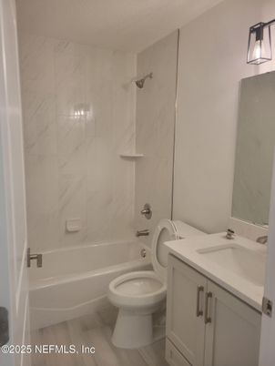 Bathroom, Dual Sink Vanities, Interior, Marble Walls, Wood Texture Flooring