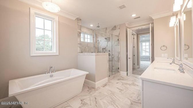 Bathroom, Dual Sink Vanities, Free Standing Baths, Glass Shower, Interior, Marble, Marble Walls, Recessed Lighting