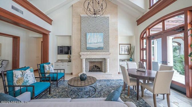 Chandelier, Dining room, Fireplace, Interior, Living room, Stone Walls