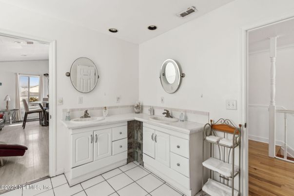 Bathroom, Dual Sink Vanities, Interior, Recessed Lighting, Wood Texture Flooring