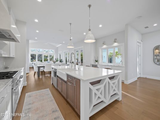 Dining room, Interior, Kitchen, Pendant Lights, Recessed Lighting, Stainless Steel Appliances, Wood Texture Flooring