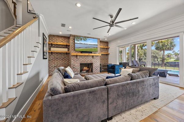 Fireplace, Interior, Living room, Recessed Lighting, Stone Walls, Wood Texture Flooring