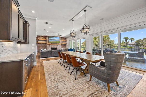 Dining room, Fireplace, Interior, Living room, Pendant Lights, Recessed Lighting, Stone Walls, Wood Texture Flooring