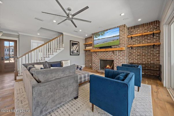 Fireplace, Interior, Living room, Recessed Lighting, Stone Walls, Wood Texture Flooring