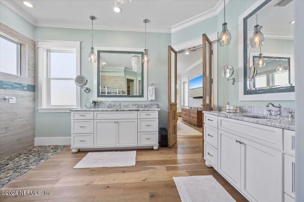 Bathroom, Dual Sink Vanities, Interior, Pendant Lights, Recessed Lighting, Wood Texture Flooring