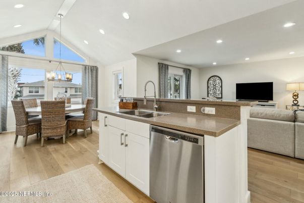 Dining room, Interior, Kitchen, Pendant Lights, Recessed Lighting, Stainless Steel Appliances, Wood Texture Flooring