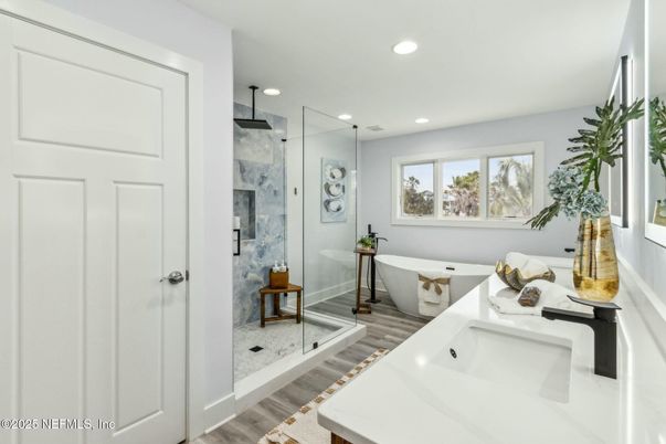 Bathroom, Free Standing Baths, Glass Shower, Interior, Marble Walls, Recessed Lighting, Wood Texture Flooring