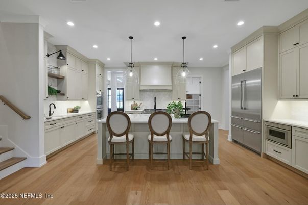Interior, Kitchen, Pendant Lights, Recessed Lighting, Stainless Steel Appliances, Wood Texture Flooring