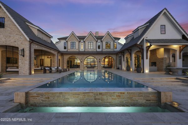 Exterior, Facade, Brick Facade, Pool, Tudor Revival