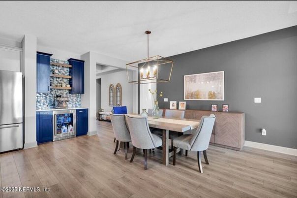 Dining room, Interior, Kitchen, Pendant Lights, Stainless Steel Appliances, Wood Texture Flooring