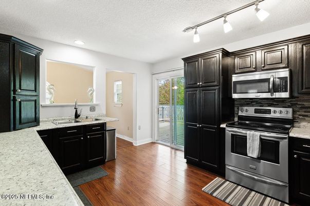 Interior, Kitchen, Recessed Lighting, Stainless Steel Appliances, Wood Texture Flooring