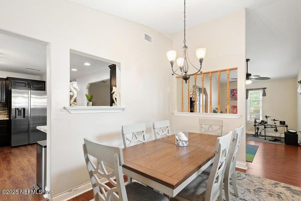 Dining room, Interior, Kitchen, Pendant Lights, Recessed Lighting, Stainless Steel Appliances, Wood Texture Flooring