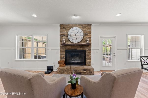 Fireplace, Interior, Living room, Recessed Lighting, Stone Walls, Wood Texture Flooring