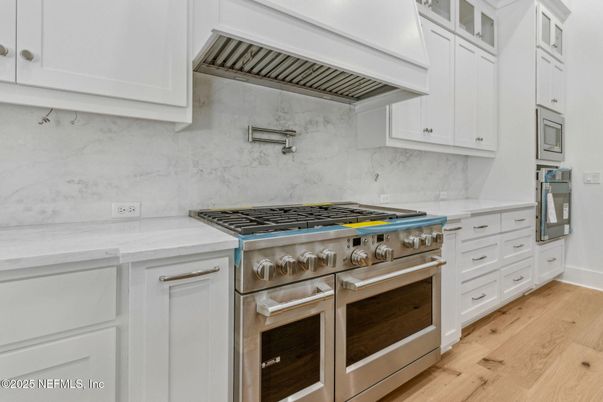 Interior, Kitchen, Marble Walls, Stainless Steel Appliances, Wood Texture Flooring