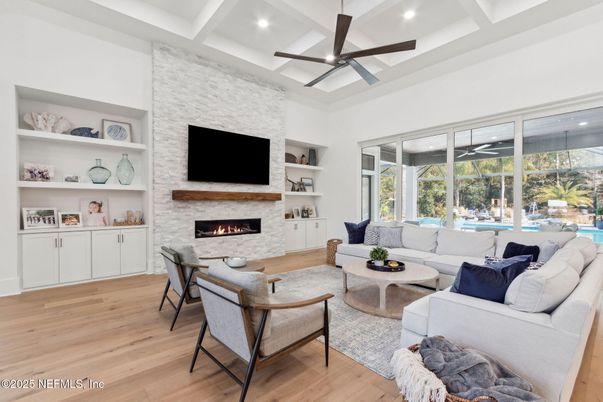 Fireplace, Interior, Living room, Recessed Lighting, Stone Walls, Wood Texture Flooring