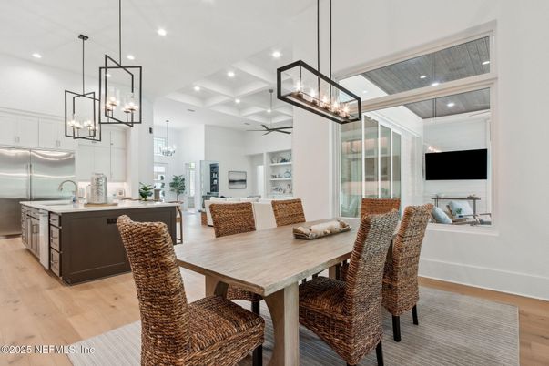 Dining room, Interior, Kitchen, Pendant Lights, Recessed Lighting, Stainless Steel Appliances, Wood Texture Flooring