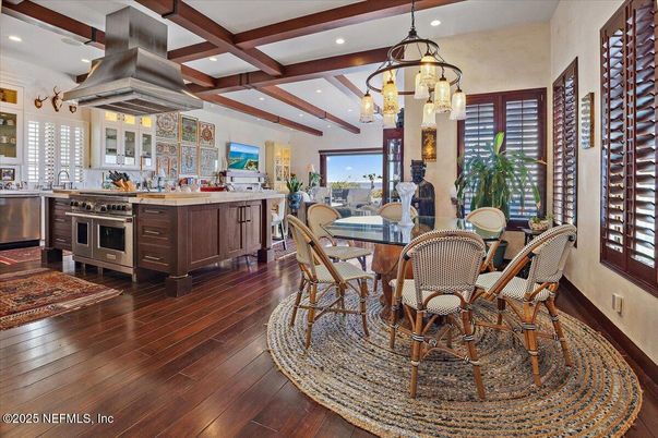 Chandelier, Dining room, Interior, Kitchen, Pendant Lights, Recessed Lighting, Stainless Steel Appliances, Wooden Beams, Wood Texture Flooring