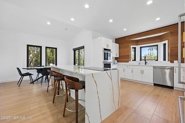 Dining room, Interior, Kitchen, Recessed Lighting, Stainless Steel Appliances, Wood Texture Flooring