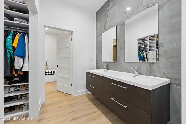 Bathroom, Dual Sink Vanities, Interior, Recessed Lighting, Walk-in Closets, Wood Texture Flooring