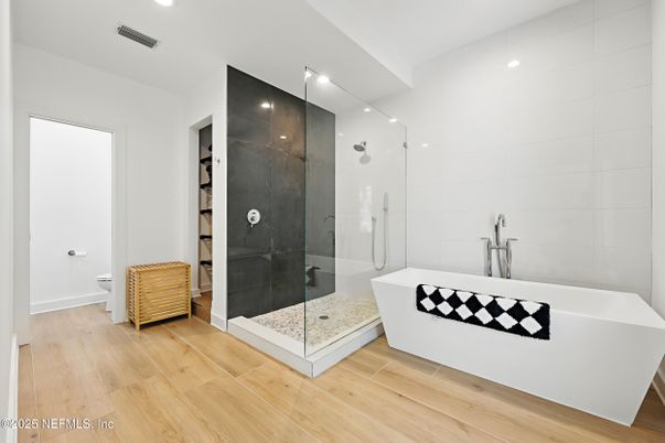 Bathroom, Free Standing Baths, Glass Shower, Interior, Recessed Lighting, Wood Texture Flooring
