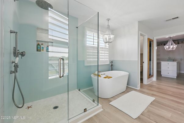 Bathroom, Chandelier, Free Standing Baths, Glass Shower, Interior, Pendant Lights, Wood Texture Flooring