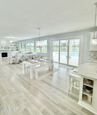 Dining room, Fireplace, Interior, Living room, Pendant Lights, Wood Texture Flooring