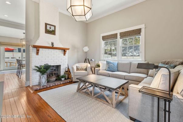 Fireplace, Interior, Living room, Pendant Lights, Recessed Lighting, Stone Walls, Wood Texture Flooring