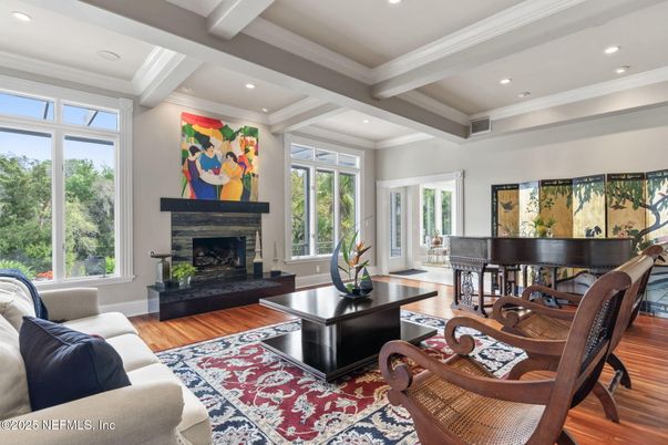 Fireplace, Interior, Living room, Piano, Recessed Lighting, Wood Texture Flooring