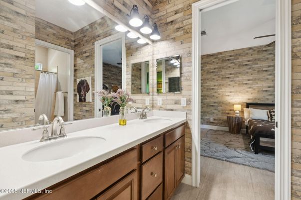 Bathroom, Bedroom, Dual Sink Vanities, Interior, Stone Walls, Wood Texture Flooring