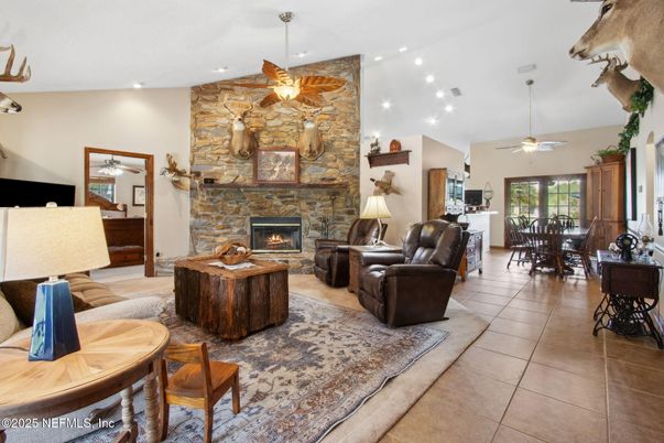 Dining room, Fireplace, Interior, Living room, Recessed Lighting, Stone Walls