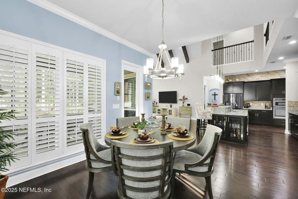 Dining room, Interior, Kitchen, Pendant Lights, Recessed Lighting, Stainless Steel Appliances, Wood Texture Flooring