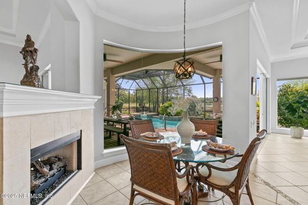 Dining room, Fireplace, Interior, Pendant Lights, Pool, Sun Room