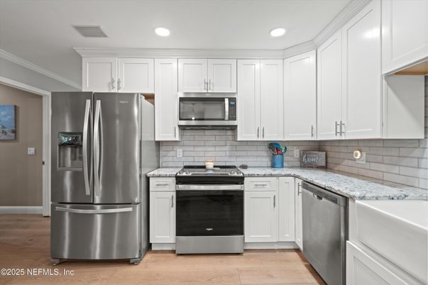 Interior, Kitchen, Recessed Lighting, Stainless Steel Appliances, Wood Texture Flooring