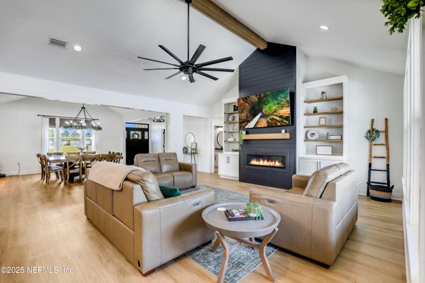 Dining room, Fireplace, Interior, Living room, Pendant Lights, Recessed Lighting, Wooden Beams, Wood Texture Flooring