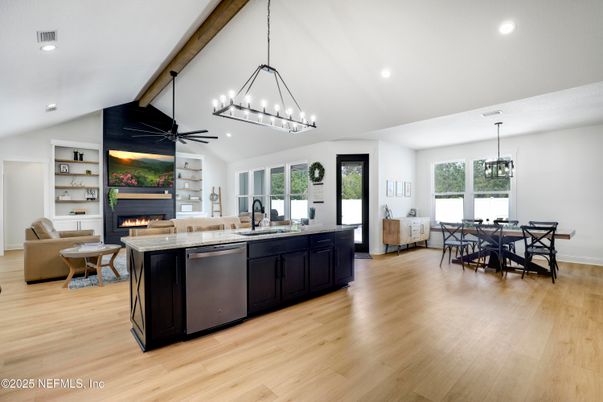 Chandelier, Dining room, Fireplace, Interior, Kitchen, Living room, Pendant Lights, Recessed Lighting, Wood Texture Flooring