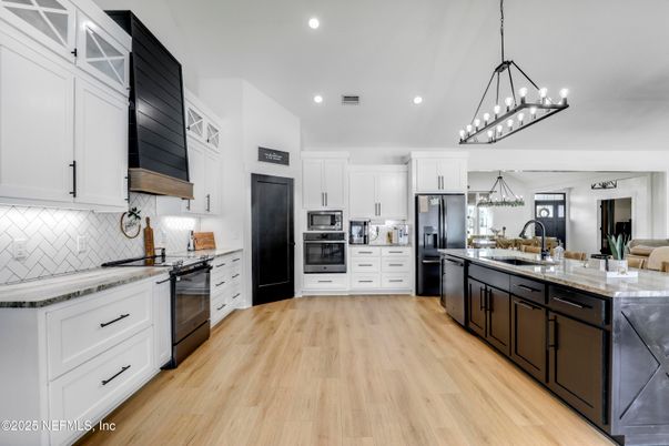 Chandelier, Interior, Kitchen, Pendant Lights, Recessed Lighting, Stainless Steel Appliances, Wood Texture Flooring