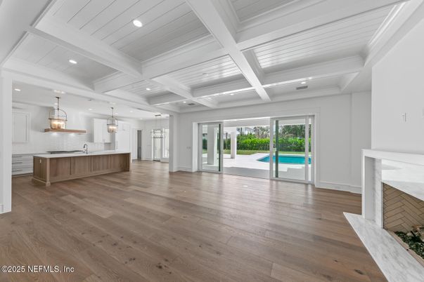 Empty room, Fireplace, Interior, Kitchen, Pendant Lights, Recessed Lighting, Wood Texture Flooring